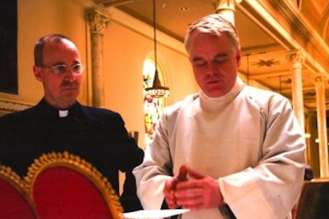 <p>Fr James Martin SJ, left, with Philip Seymour Hoffman during the filming of Doubt (photo by Andy Schwartz)</p>