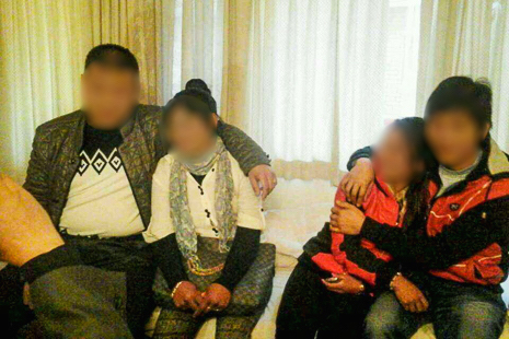 <p>In this photo taken on a phone camera and given to ucanews.com by a woman who agreed to marry a Chinese man through a Kathmandu marriage agency, young Nepali women meet their new Chinese and South Korean husbands (Photo submitted)</p>