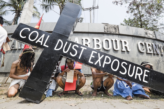 Manila's poor mark Holy Week with protest against coal