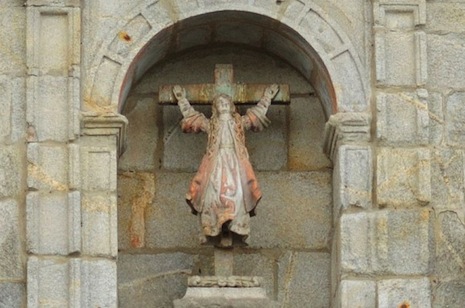 An unusual crucifix in the seaside Spanish town of Bayona