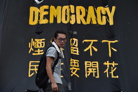 In Hong Kong propaganda war, China plays waiting game