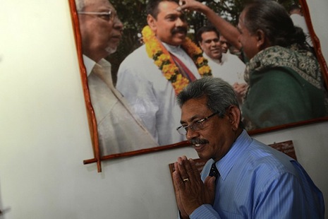 Sri Lanka slaps travel ban on former president's brother over arms stash