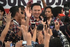 Jakarta's Christian governor faces tough run-off vote