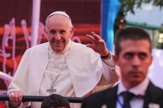 Stop playing with mobile phones, care for others, pope tells youth