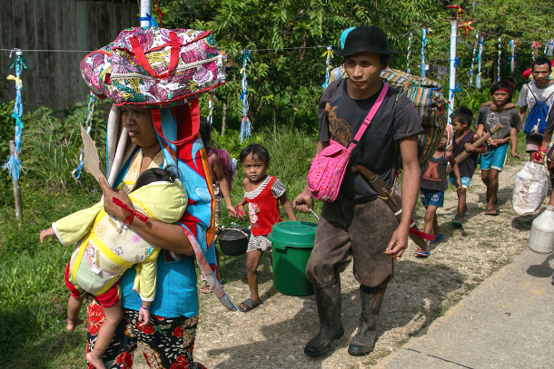 Displaced tribal people of Mindanao trek back home