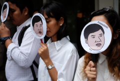 Thai police drop probe into brutal attack on activist