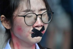 Young protester highlights sex abuse in Thai schools