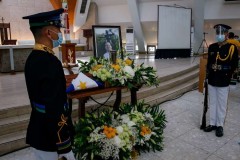 Family holds quick cremation for former Philippine leader