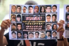 Hong Kong activists fade from view as court case drags