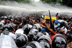 Crisis-hit Sri Lanka hikes rates as protests spiral