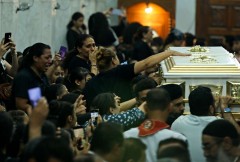 Egyptians mourn 41 dead in Cairo Coptic church fire