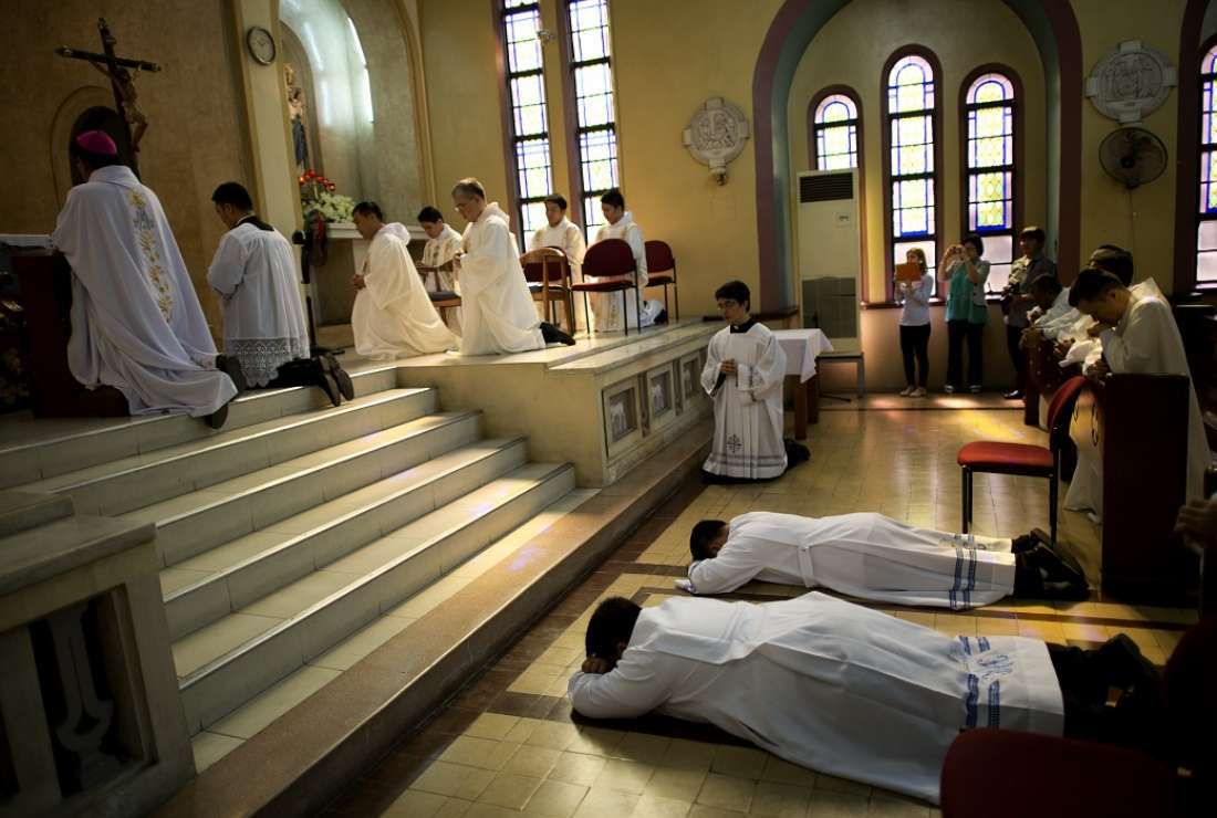 Seminarians are seen here inside the UST Central Seminary Chapel during their ordination to the Sacred Order of Deacons in Manila in this 2014 file photo