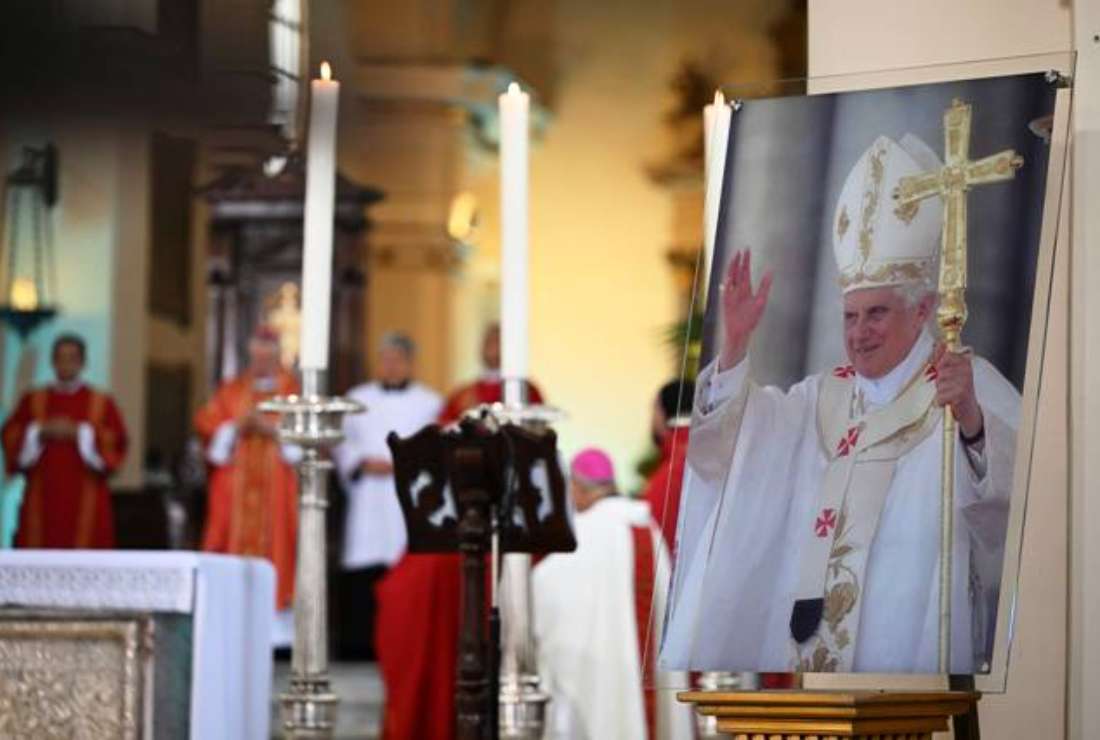 A portrait of Pope Emeritus Benedict XVI is seen during the Eucharist in Primada Cathedral in Bogota ahead of the late pontiff's funeral on Jan. 5