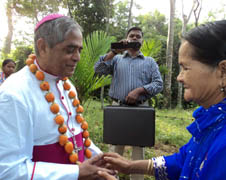 Khasia people welcome Auxiliary Bishop Theotonius Gomes of Dhaka at the Christ the King celebration 