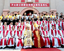 Newly-ordained Coadjutor Bishop John Baptist Li Suguang of Nanchang diocese (in gold vestments), Bishop John Wu Shizhen, priests and nuns pose for a photo after the Oct. 31 ordination 